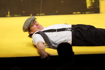 Doug performing onstage