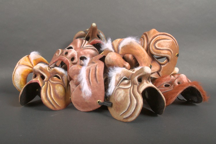 A pile of Commedia dell’Arte masks